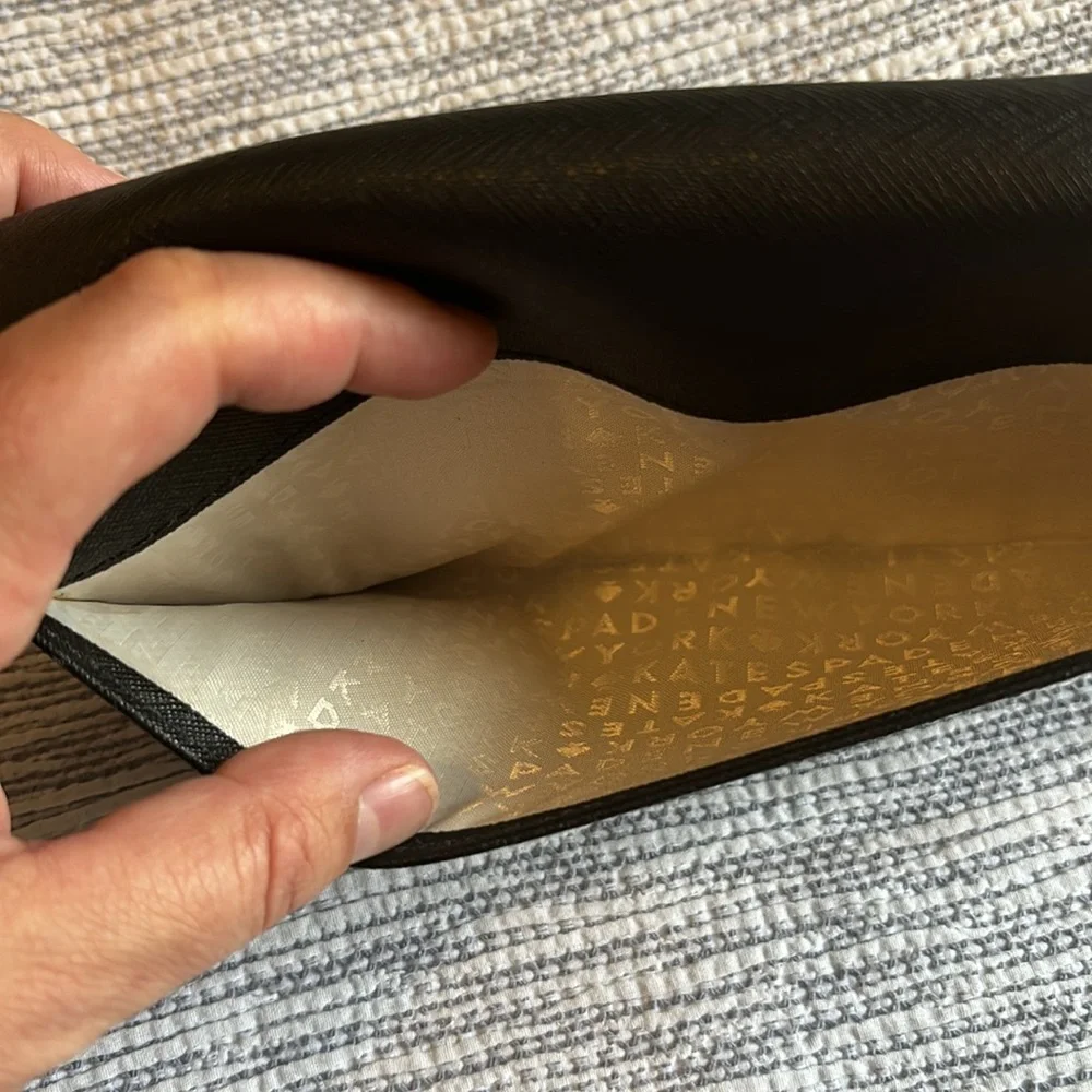Kate Spade black clutch wallet. Pre owned